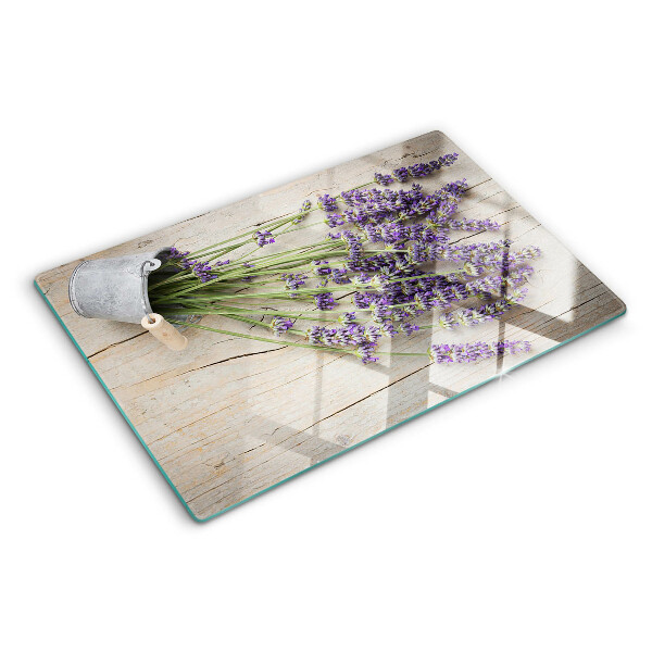 Snijplanken van glas Lavendel in een pot op een houten achtergrond