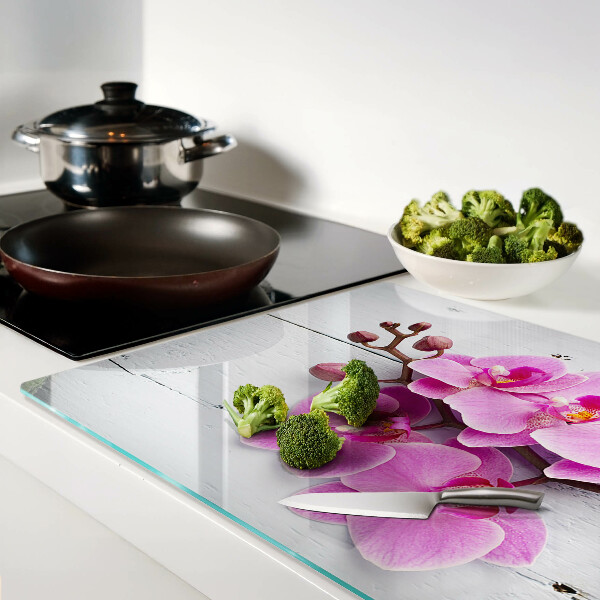 Glazen snijplanken Orchideeën op een witte achtergrond