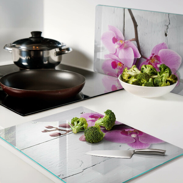 Glazen snijplanken Orchideeën op een witte achtergrond