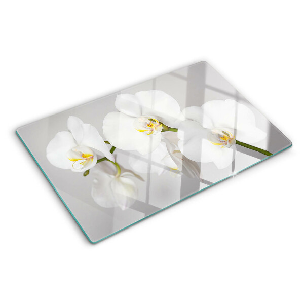 Snijplanken glas Orchideeën op een spiegelende achtergrond