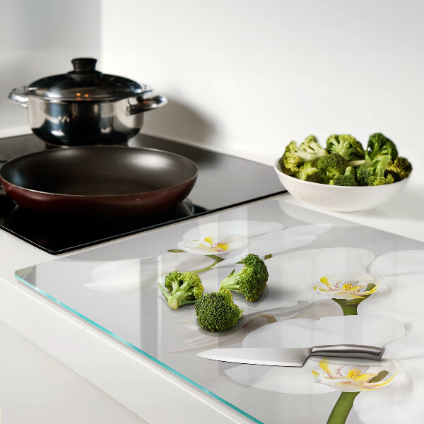 Snijplanken glas Orchideeën op een spiegelende achtergrond