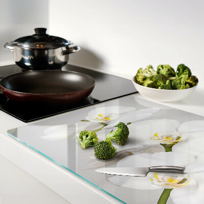 Snijplanken glas Orchideeën op een spiegelende achtergrond