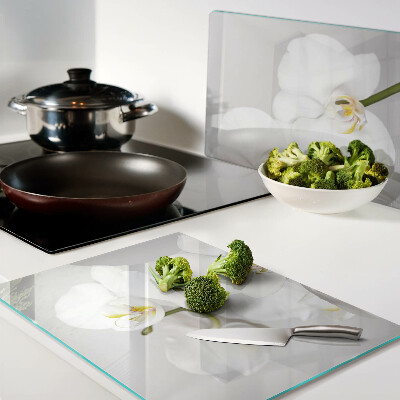 Snijplanken glas Orchideeën op een spiegelende achtergrond