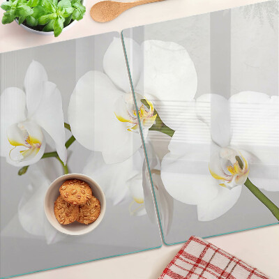 Snijplanken glas Orchideeën op een spiegelende achtergrond