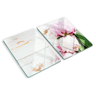 Snijplanken van glas Pioenrozen op een houten achtergrond