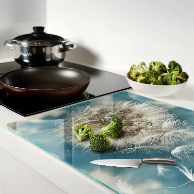 Snijplanken van glas Paardenbloemen tegen de hemel