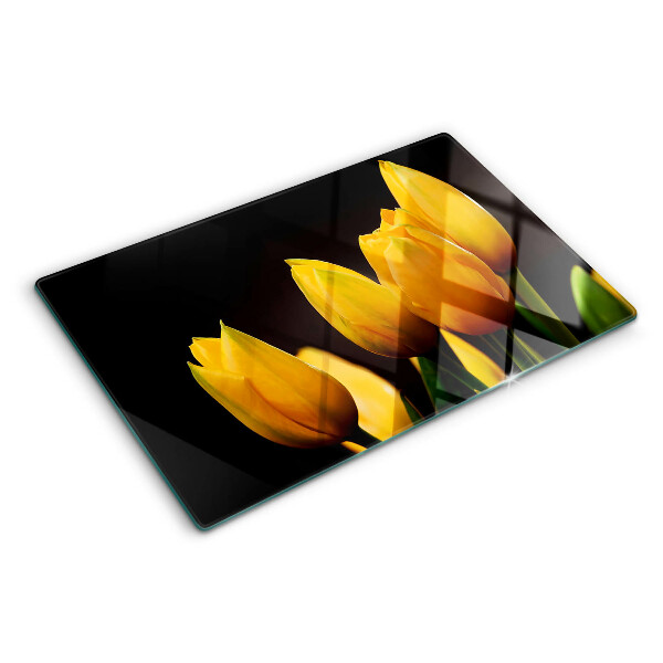 Snijplanken glas Gele tulpen op een zwarte achtergrond