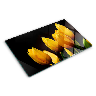Snijplanken glas Gele tulpen op een zwarte achtergrond