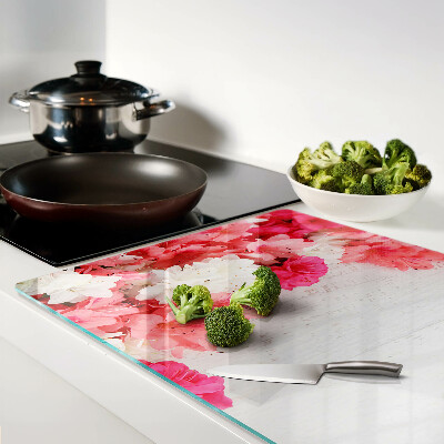 Snijplanken van glas Bloemen in roze en witte tinten.