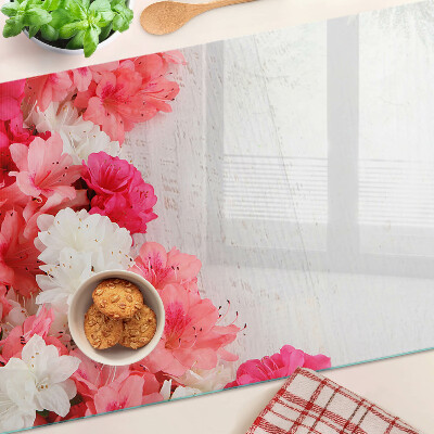 Snijplanken van glas Bloemen in roze en witte tinten.