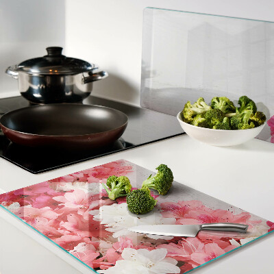 Snijplanken van glas Bloemen in roze en witte tinten.