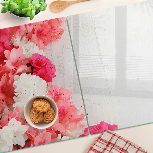 Snijplanken van glas Bloemen in roze en witte tinten.