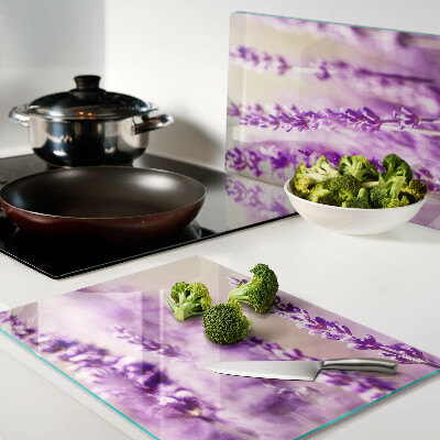 Glazen snijplanken Lavendelbloemen op een achtergrond met kleurverloop