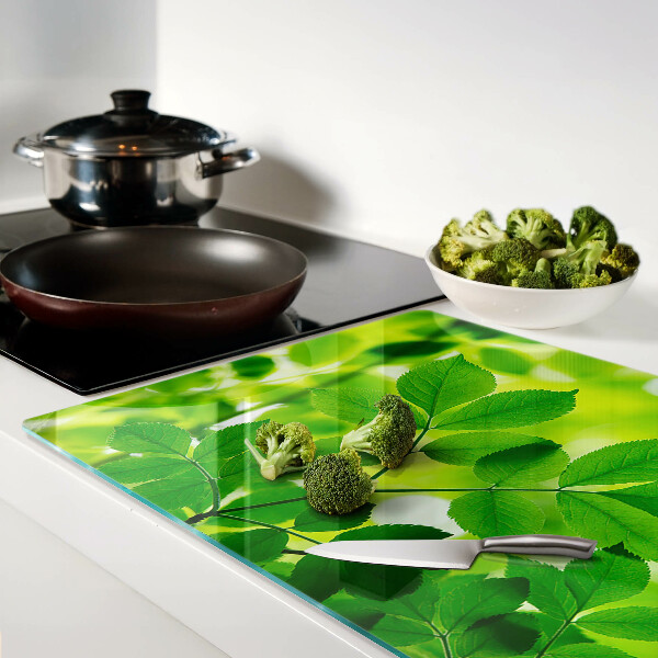 Snijplanken glas Bladeren op een groene achtergrond