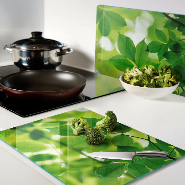 Snijplanken glas Bladeren op een groene achtergrond