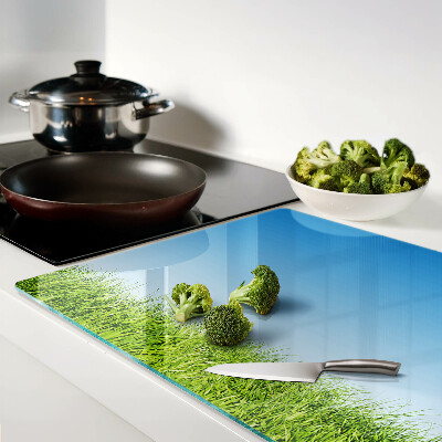 Snijplanken glas Groene weide onder een blauwe hemel