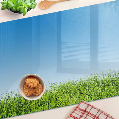 Snijplanken glas Groene weide onder een blauwe hemel