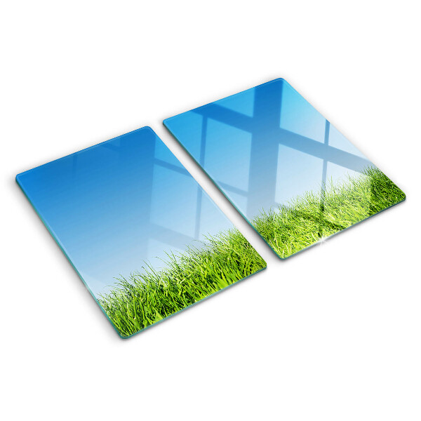 Snijplanken glas Groene weide onder een blauwe hemel