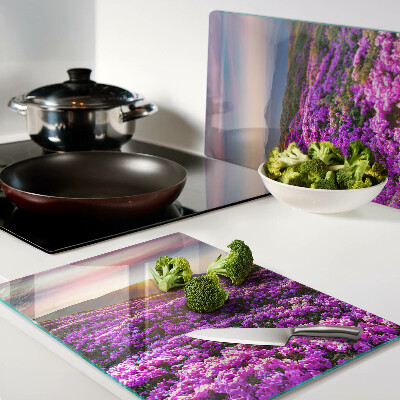 Glazen snijplanken Bloemenlandschap bij zonsondergang