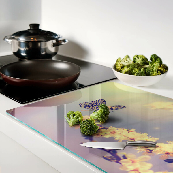 Glazen snijplanken Vlindermotief op een bloemenachtergrond