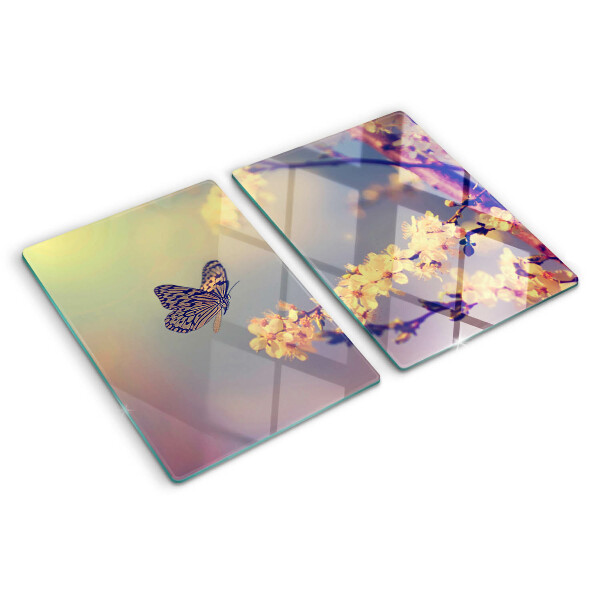 Glazen snijplanken Vlindermotief op een bloemenachtergrond
