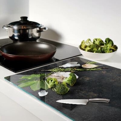 Glazen snijplanken Bloemen en kruiden op een marmeren achtergrond