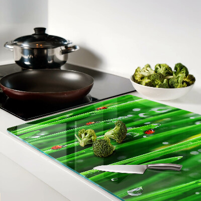 Glazen snijplanken Waterdruppels op gras met lieveheersbeestjes