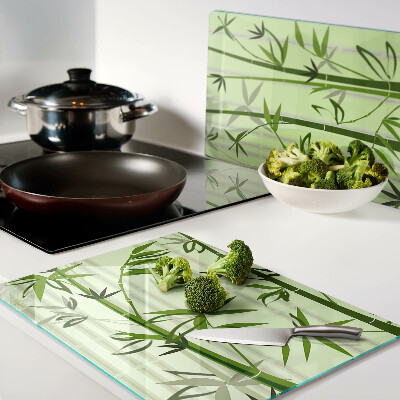 Snijplanken glas Bamboe op een groene achtergrond
