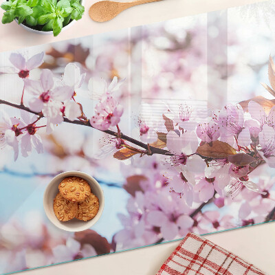 Glazen snijplanken Kersenbloesems op een blauwe achtergrond