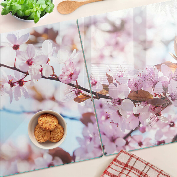 Glazen snijplanken Kersenbloesems op een blauwe achtergrond