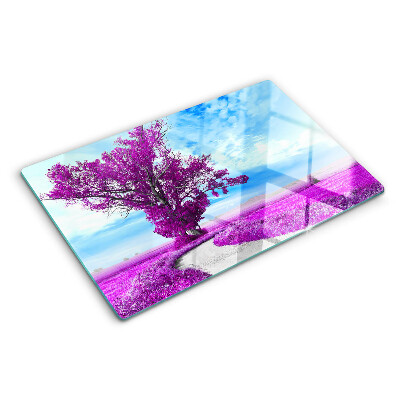 Snijplanken glas Een paarse boom tegen de hemel