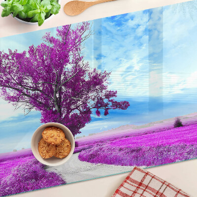 Snijplanken glas Een paarse boom tegen de hemel