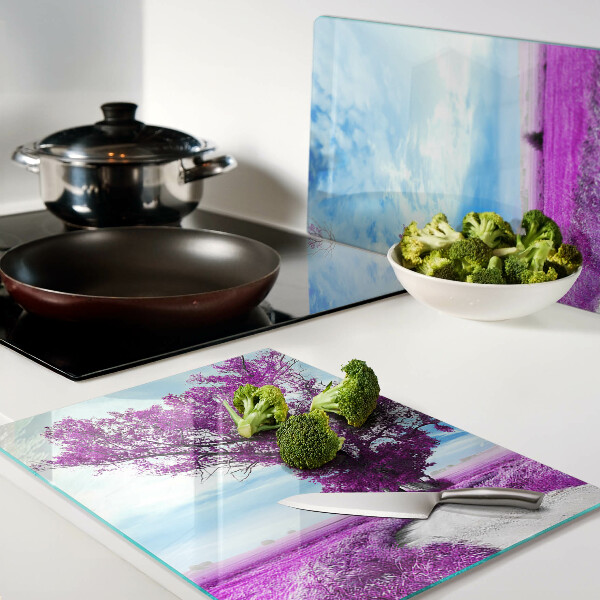 Snijplanken glas Een paarse boom tegen de hemel