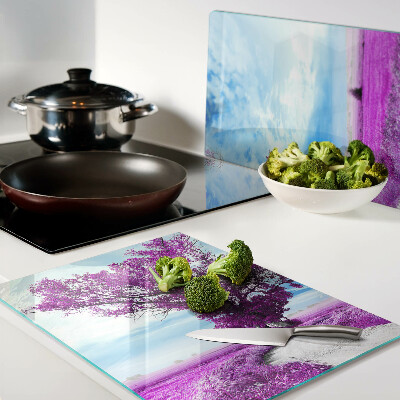 Snijplanken glas Een paarse boom tegen de hemel