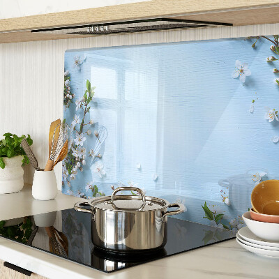 Snijplanken van glas Bloemenpatroon op een blauwe achtergrond