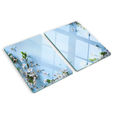 Snijplanken van glas Bloemenpatroon op een blauwe achtergrond