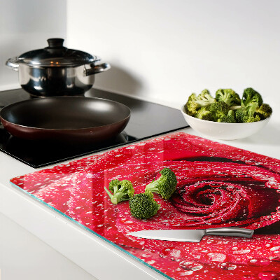 Glazen snijplanken Rode roos met waterdruppels