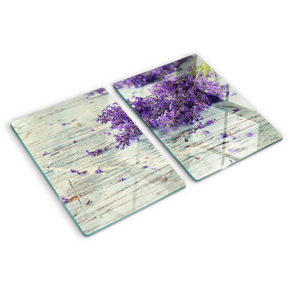 Snijplanken van glas Lavendel op een houten achtergrond