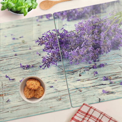Snijplanken van glas Lavendel op een houten achtergrond