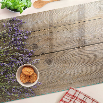 Snijplanken glas Lavendel op een houten achtergrond