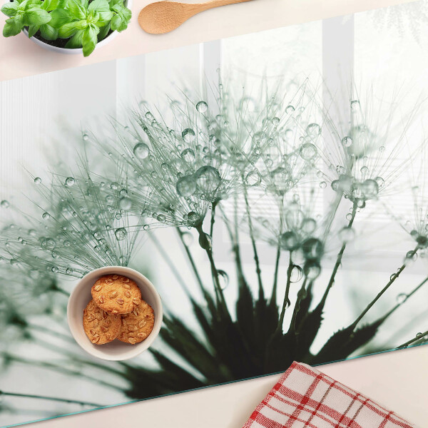 Snijplanken glas Paardenbloemen met waterdruppels