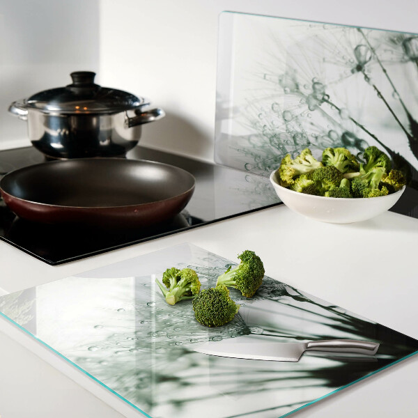 Snijplanken glas Paardenbloemen met waterdruppels