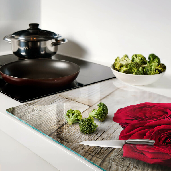 Glazen snijplanken Rode rozen op een houten achtergrond