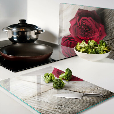 Glazen snijplanken Rode rozen op een houten achtergrond