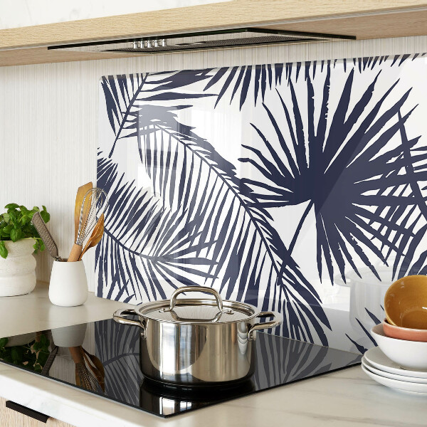 Snijplanken van glas Palmbladeren op een witte achtergrond