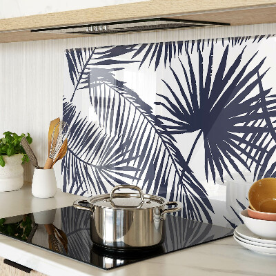 Snijplanken van glas Palmbladeren op een witte achtergrond