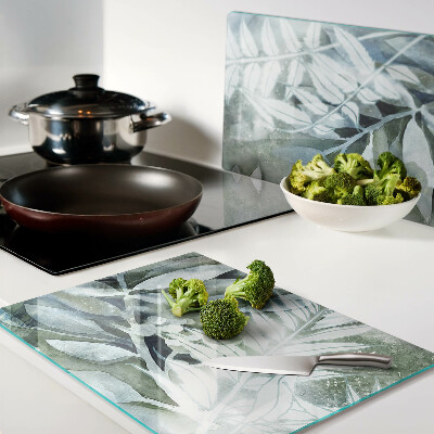 Snijplanken van glas Tropische bladeren in pasteltinten