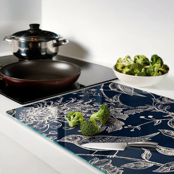 Snijplanken glas Bloemen en vogels op een donkere achtergrond