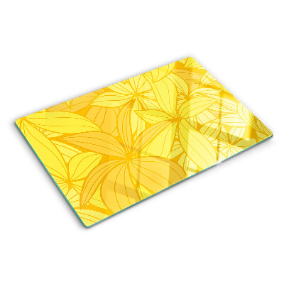 Snijplanken van glas Gele bladeren in een tropische stijl