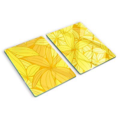 Snijplanken van glas Gele bladeren in een tropische stijl